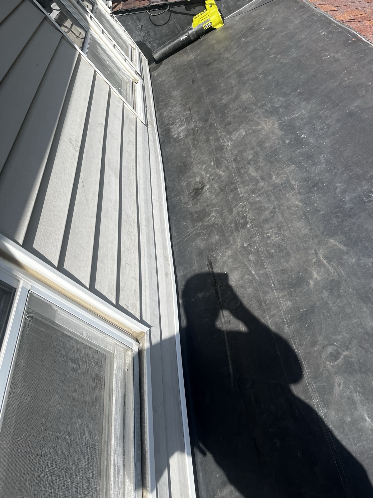 EPDM Flat Roof & Siding Integration detailed photo 3